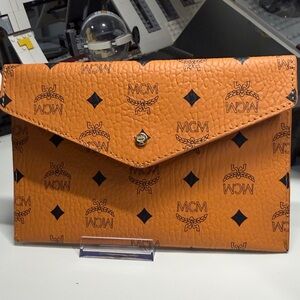 MCM Visetos Envelope Clutch – Cognac